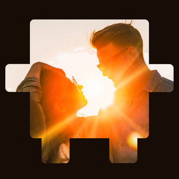 A couple looking at each other in the sun